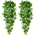 Artificial hanging pothos vine on a wall