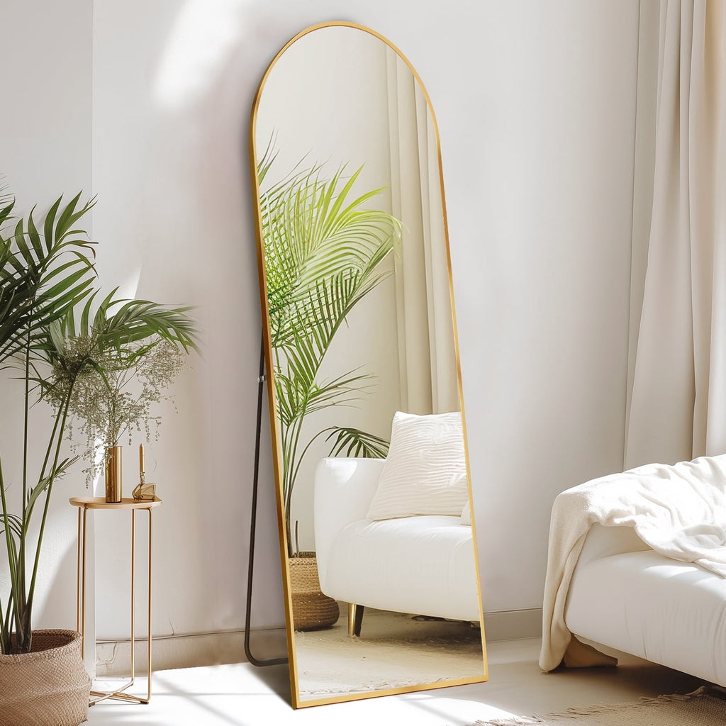 Arched floor mirror, styled in room